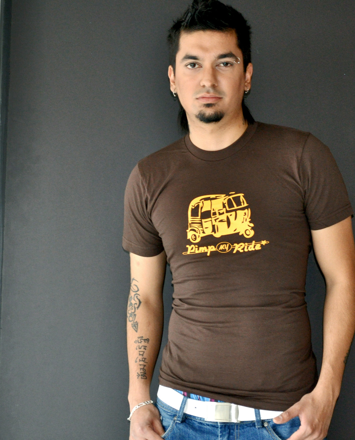 South Asian Male Model wearing American Apparel Jersey T shirt with South Asian themed graphic design on front.